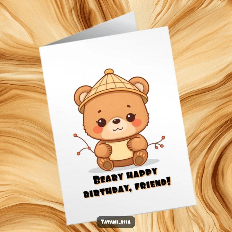 Cute Free Printable Birthday Card: Content brown bear cub in a bamboo hat, holding a delicate scroll with a peaceful look.